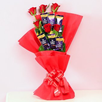 Red roses with chocolate.